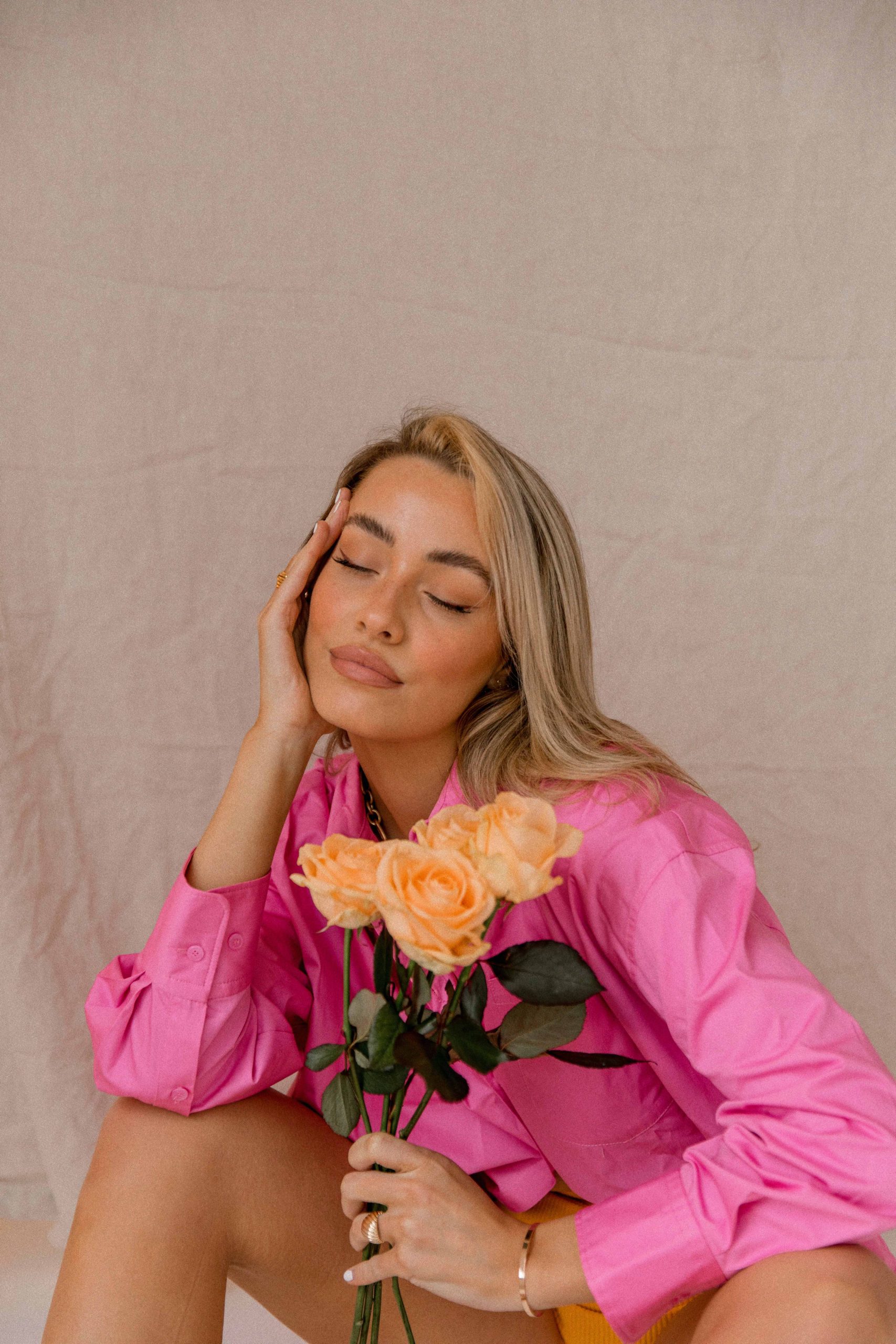 Model posing with rose Stock Photo by ©natalliajolliet 95403018